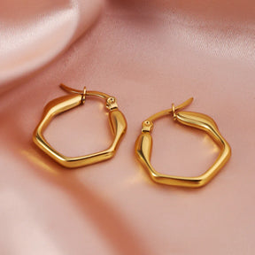 1 par de brincos de argola femininos de aço inoxidável, brincos hexagonais geométricos de metal dourado simples e requintados