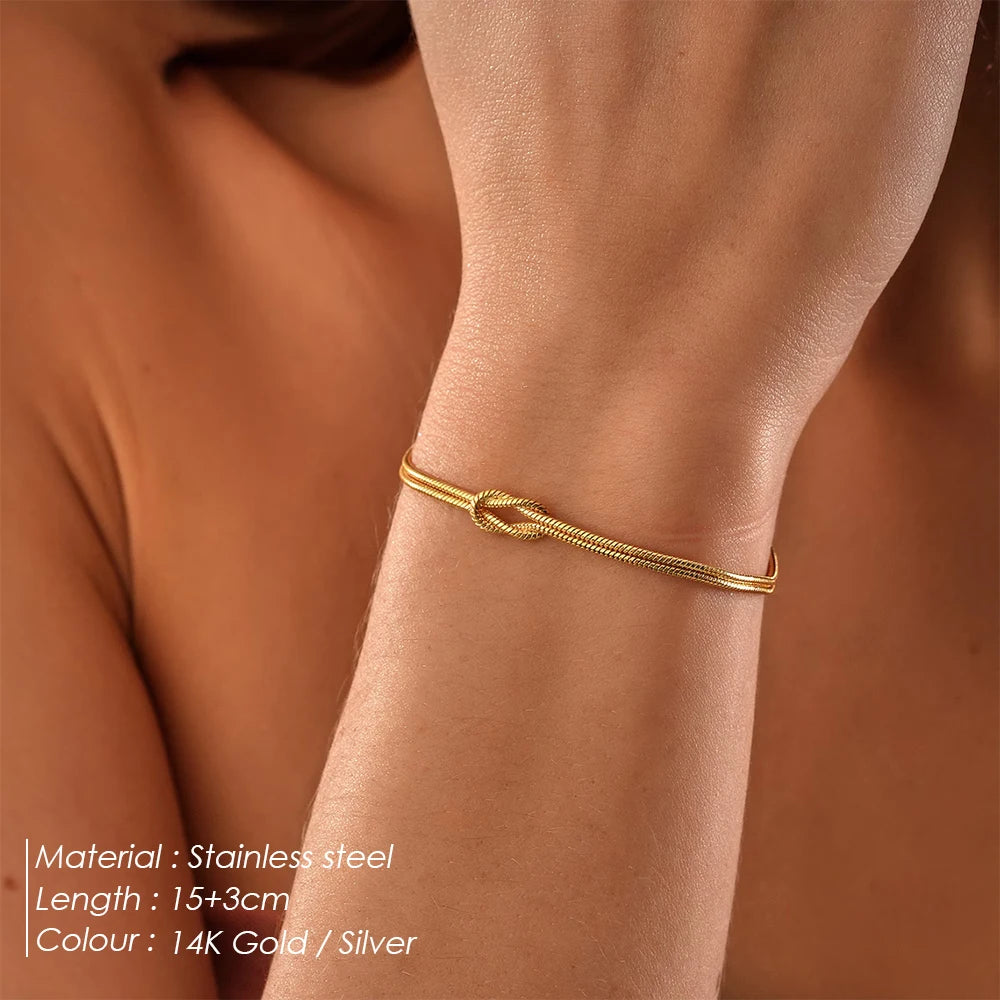 Manco moda de alta qualidade aço inoxidável banhado a ouro casal pulseiras clássico redondo cobra corrente atada acessórios simples