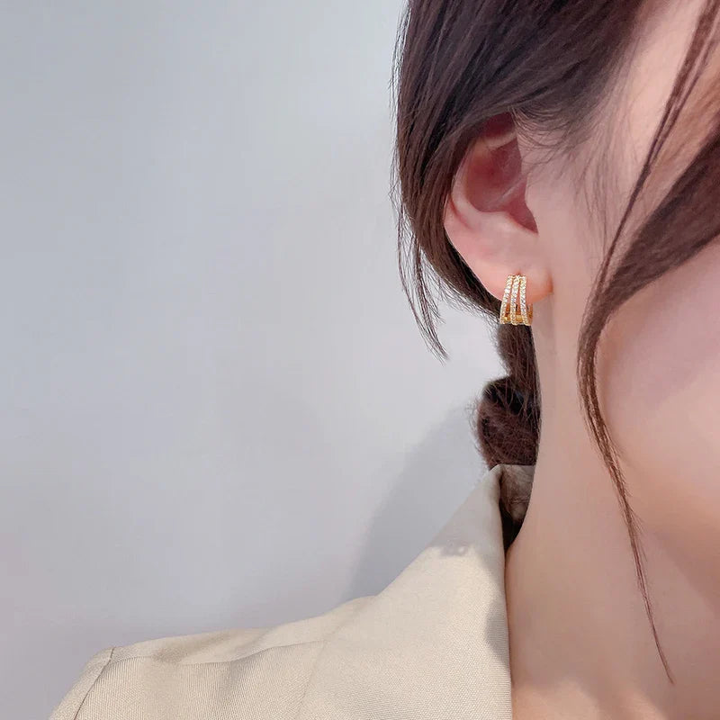 Brinco Triplo Cravejado com Zircônia